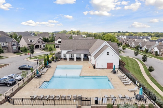 exterior space featuring a patio and a community pool