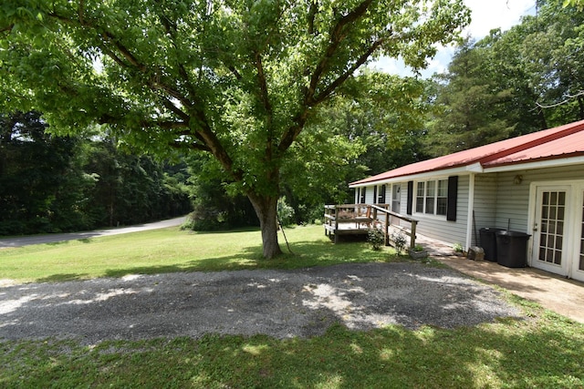 view of yard with a deck