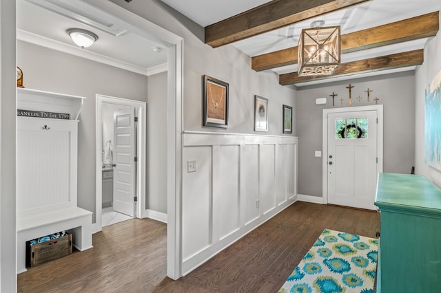 interior space with beamed ceiling and dark hardwood / wood-style flooring