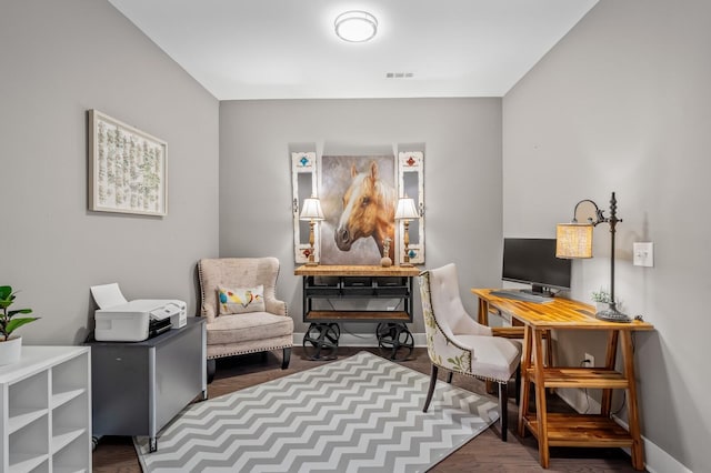 sitting room featuring dark hardwood / wood-style floors