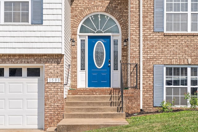 property entrance featuring a garage