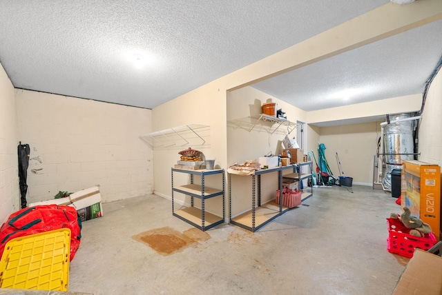 basement featuring a textured ceiling