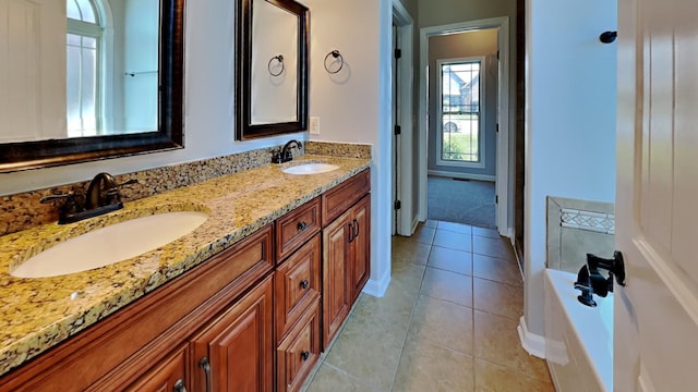 bathroom featuring tile patterned floors and vanity