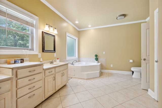 bathroom featuring tile patterned flooring, crown molding, toilet, a bathtub, and vanity