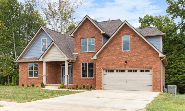 craftsman-style home featuring a front lawn and a garage