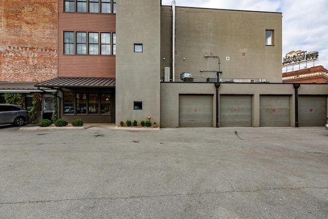 view of building exterior with a garage