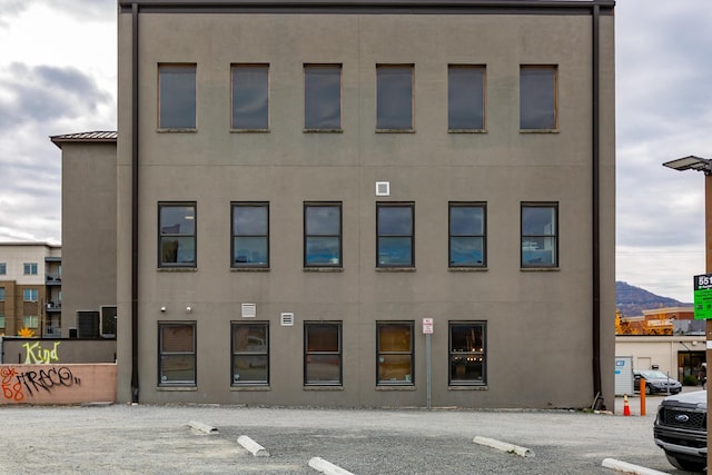 view of building exterior with a mountain view