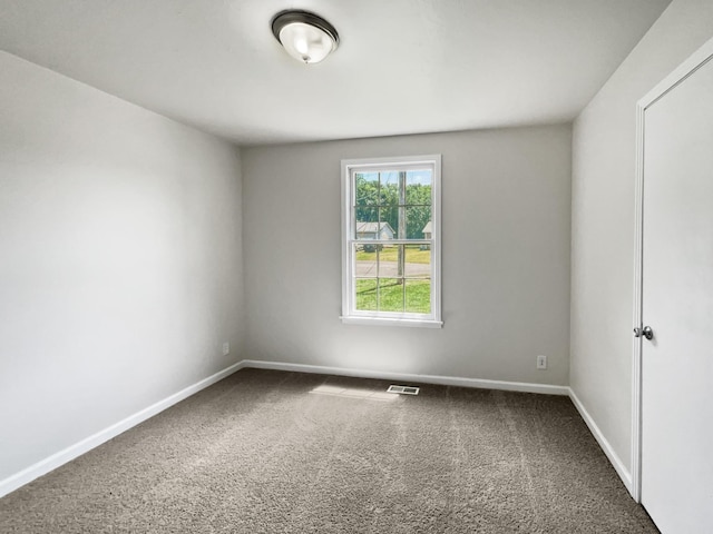 view of carpeted spare room