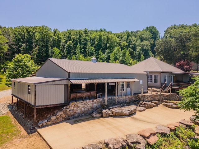 351 New Era Landing Rd, Linden, TN 37096 - rear view of property featuring a patio area and a metal roof