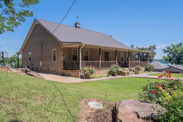 351 New Era Landing Rd, Linden, TN 37096 - back of property with covered porch, a lawn, and a metal roof