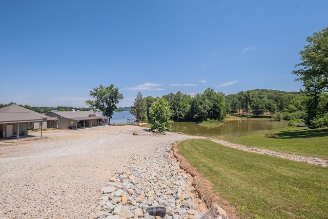 view of yard with a water view