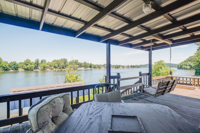 351 New Era Landing Rd, Linden, TN 37096 - wooden deck with a water view, outdoor dining space, and a ceiling fan