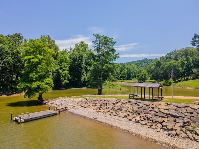 dock area featuring a gazebo and a water view