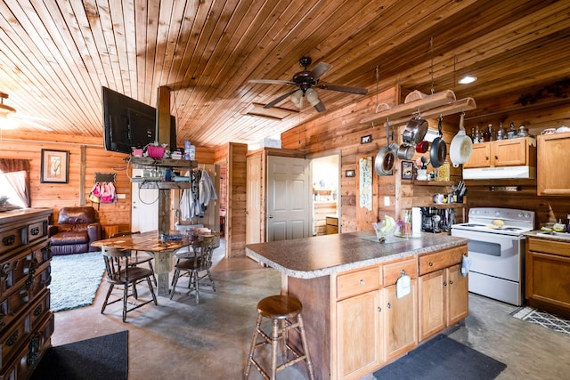 kitchen featuring a kitchen breakfast bar, white electric range oven, wooden ceiling, a center island, and wood walls