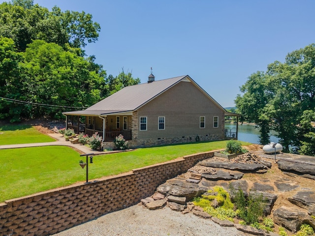 351 New Era Landing Rd, Linden, TN 37096 - back of house featuring covered porch, a yard, and a metal roof