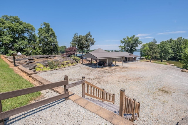 351 New Era Landing Rd, Linden, TN 37096 - back of house featuring a carport and driveway