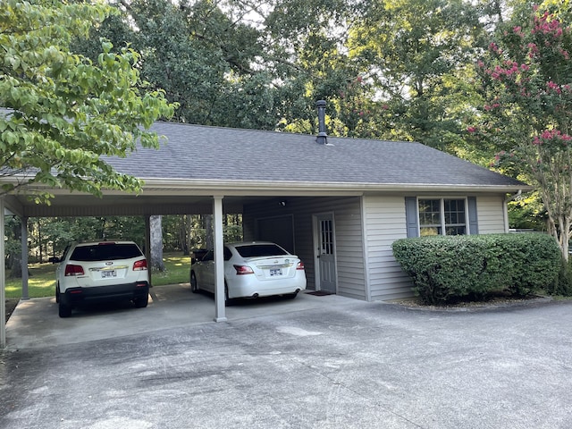 view of car parking with a carport