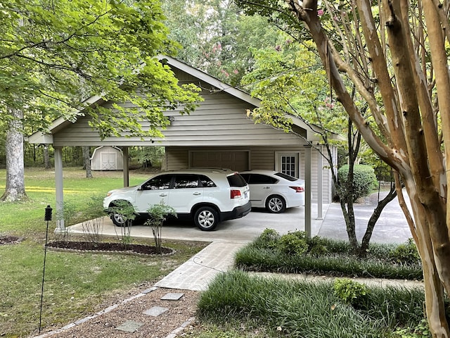 view of vehicle parking with a carport and a lawn