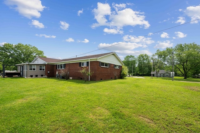 exterior space with a yard