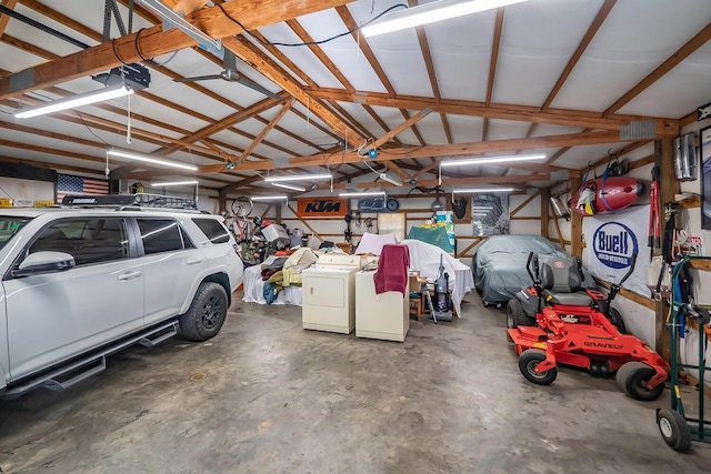 garage featuring independent washer and dryer