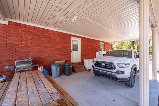 exterior space with a carport