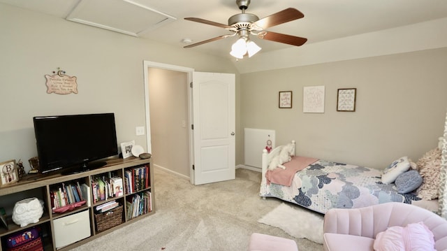 bedroom with ceiling fan and light carpet