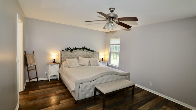 bedroom with ceiling fan and dark hardwood / wood-style flooring