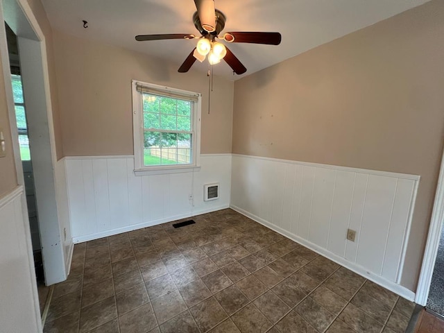 spare room featuring ceiling fan