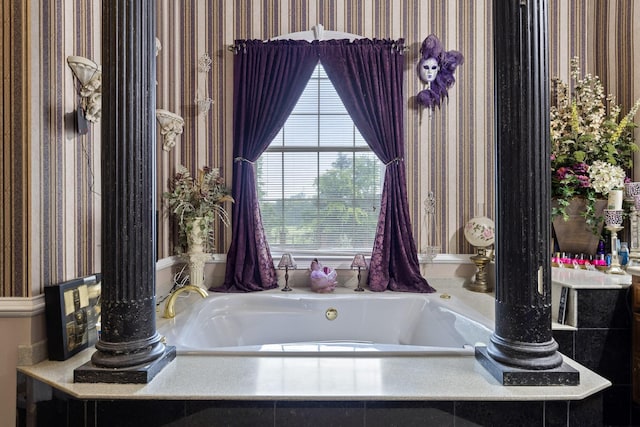 bathroom with tiled tub