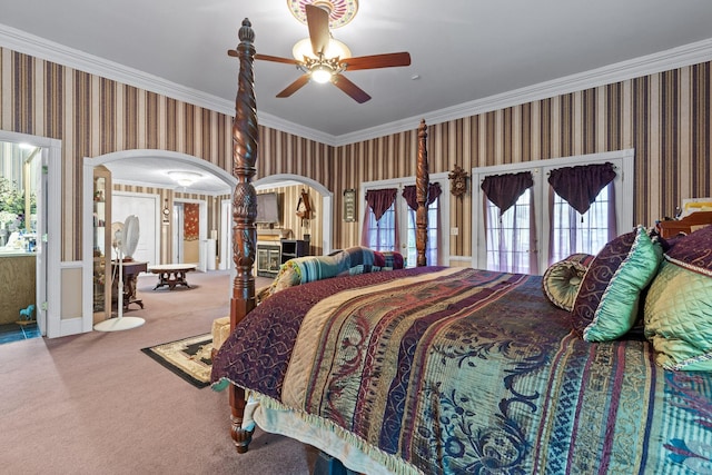 carpeted bedroom with ornamental molding, access to outside, ceiling fan, and french doors