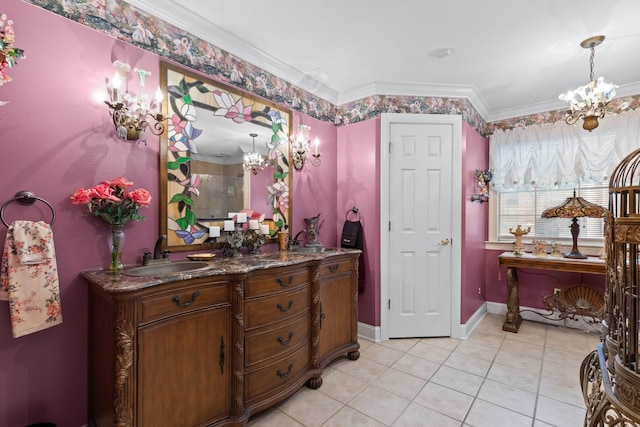 bathroom with vanity, ornamental molding, tile patterned floors, and a chandelier