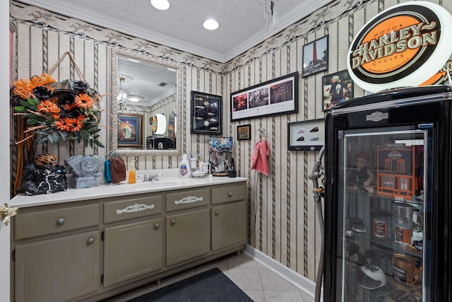 bathroom with baseboards, wallpapered walls, ornamental molding, and tile patterned floors