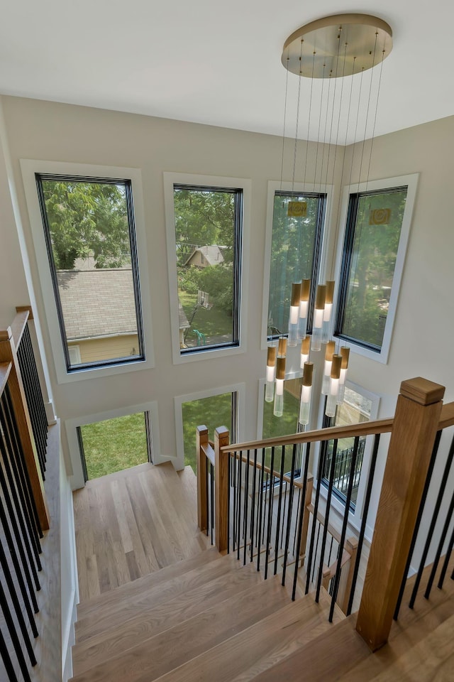 stairway featuring hardwood / wood-style floors