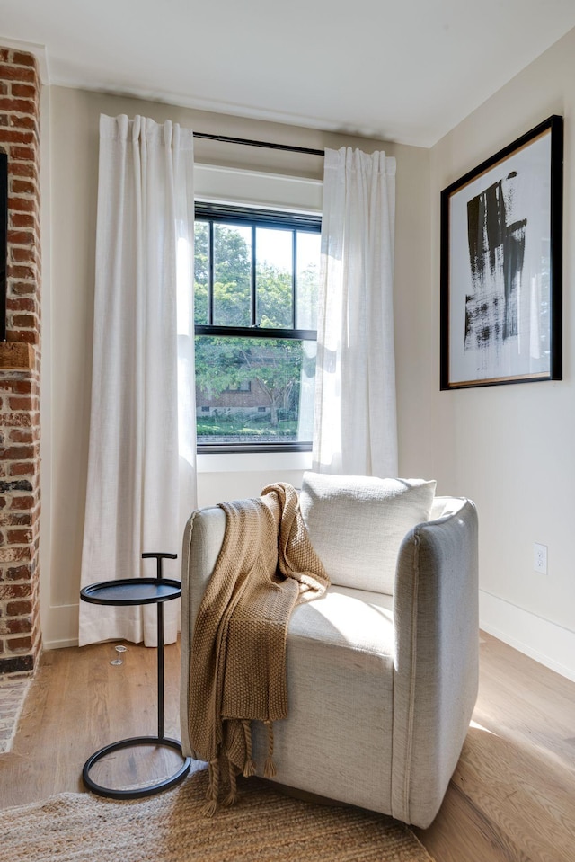 sitting room featuring light wood-type flooring