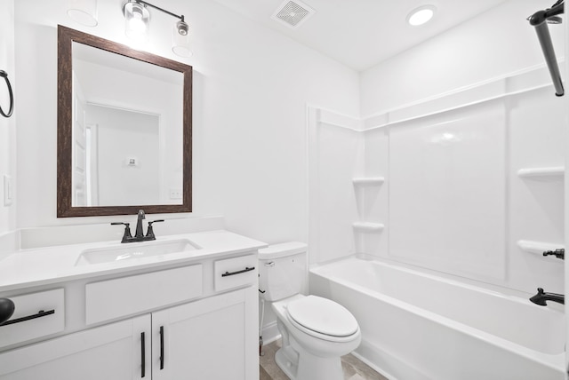 full bathroom with vanity, shower / bath combination, and toilet