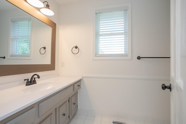 bathroom featuring vanity and tile patterned flooring