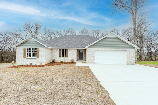 single story home featuring brick siding, a shingled roof, concrete driveway, an attached garage, and crawl space