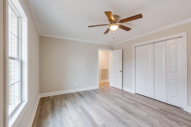 124 Lookout Ln, Pulaski, TN 38478 - unfurnished bedroom with multiple windows, light wood-type flooring, and visible vents