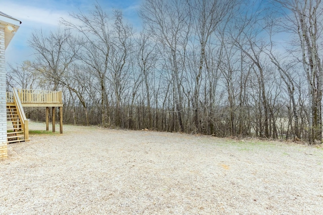 124 Lookout Ln, Pulaski, TN 38478 - view of yard with a wooden deck and stairs