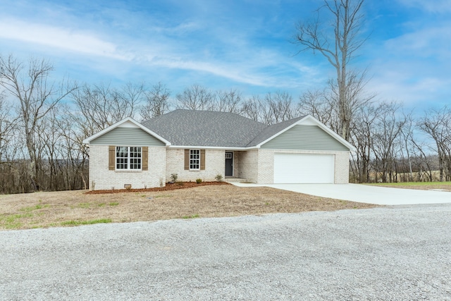 single story home featuring a garage