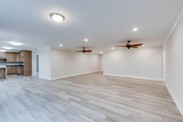 124 Lookout Ln, Pulaski, TN 38478 - unfurnished living room featuring baseboards, recessed lighting, light wood-type flooring, and crown molding