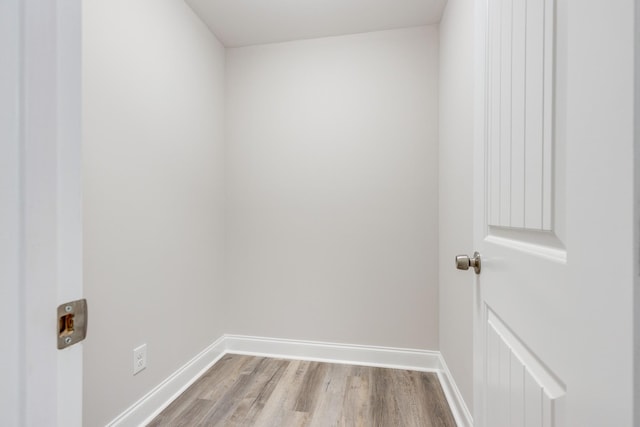 124 Lookout Ln, Pulaski, TN 38478 - clothes washing area with baseboards and wood finished floors