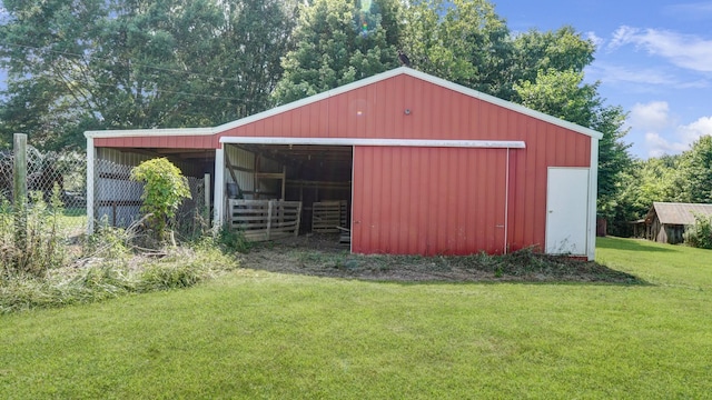 view of outdoor structure with a yard