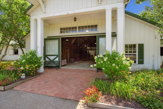 entrance to property with a patio