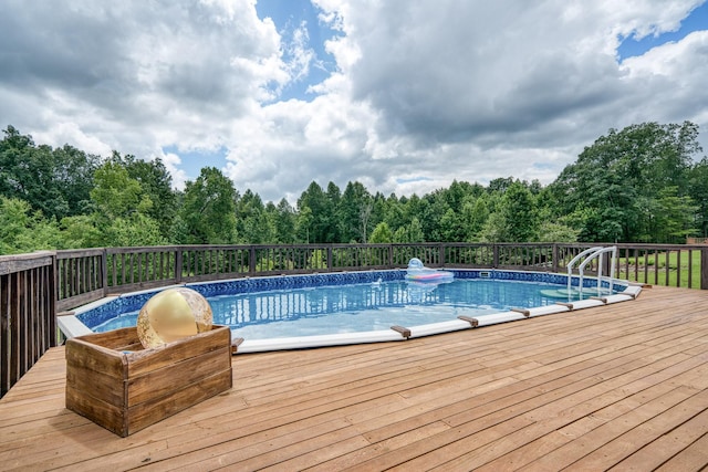 view of pool with a deck