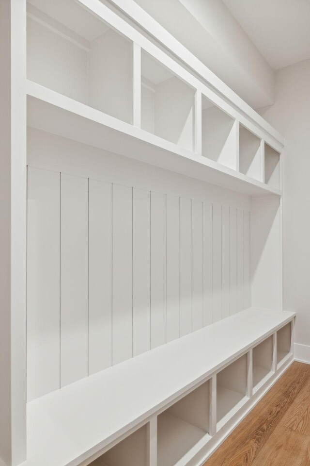 mudroom with hardwood / wood-style floors