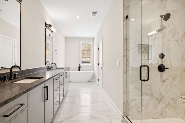 bathroom featuring tile patterned floors, separate shower and tub, and vanity