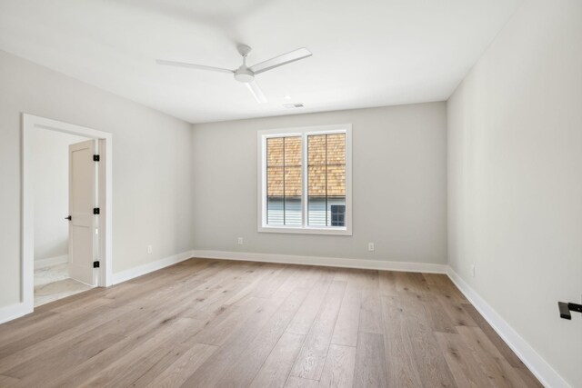 unfurnished room with ceiling fan and light hardwood / wood-style flooring