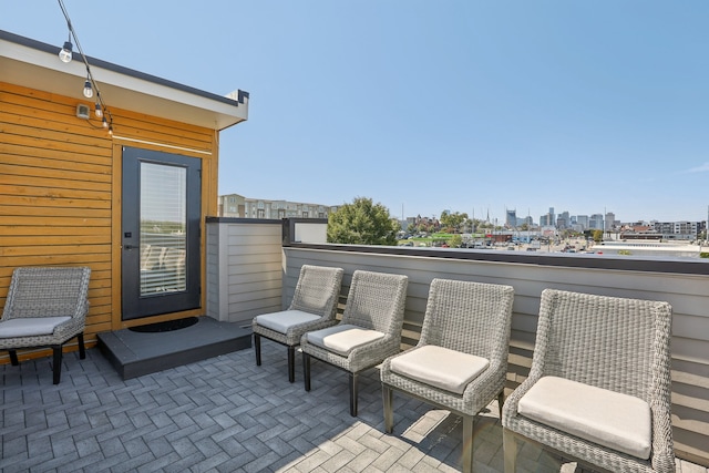 view of patio with a balcony