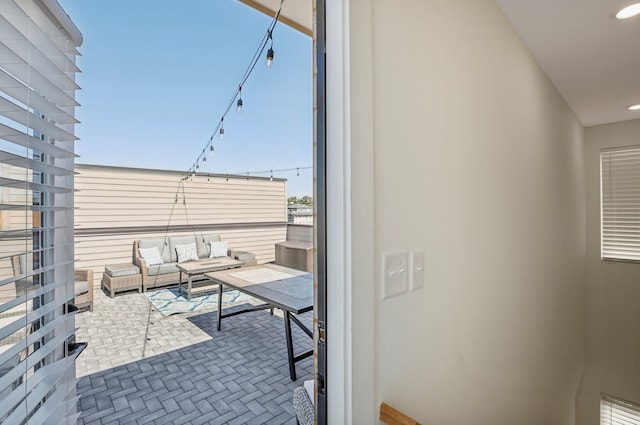 view of patio / terrace featuring a balcony and outdoor lounge area